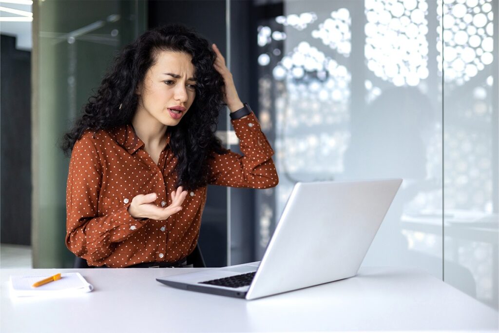 Automated Branded Stories: Turn Med Spa No-Shows into Instant Bookings with Zero Design Effort 2 Frustrated med spa receptionist dealing with last-minute client no-shows and empty appointment slots.